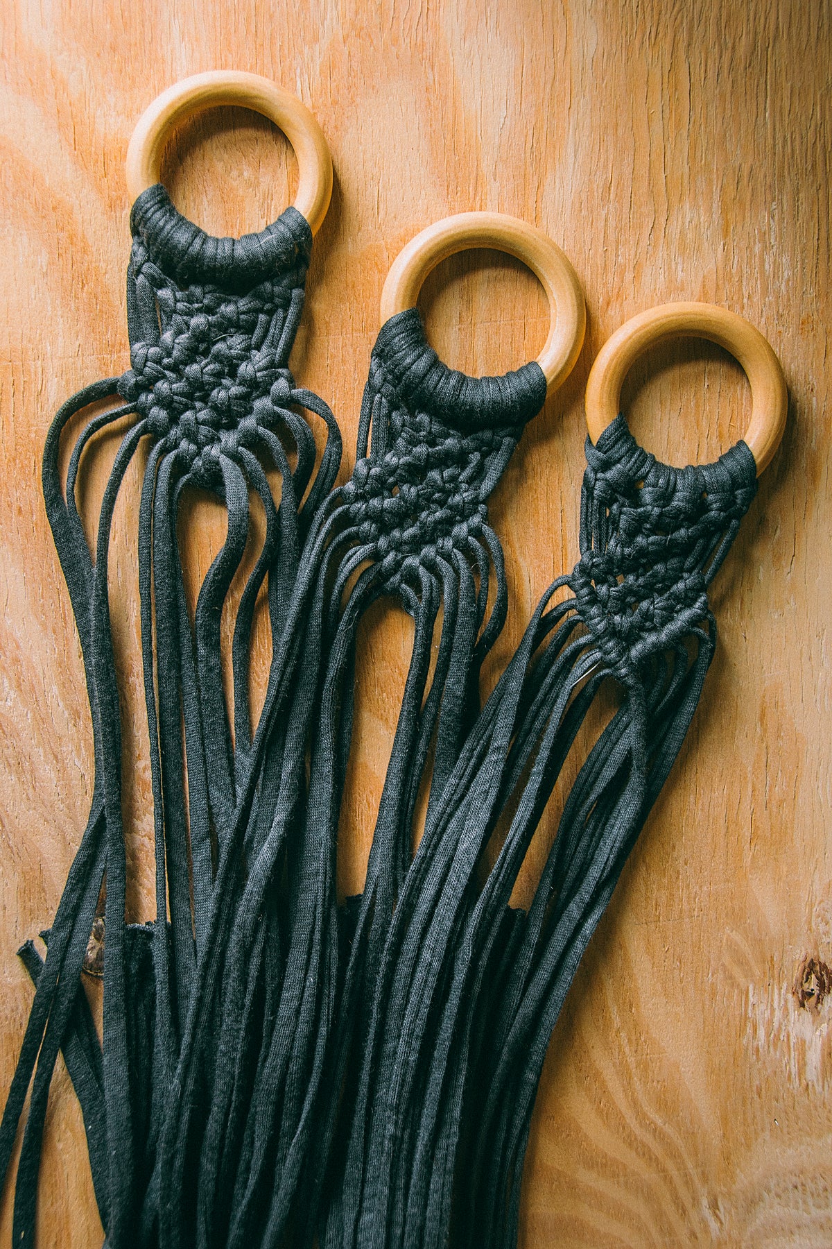Grey hanger for ukulele