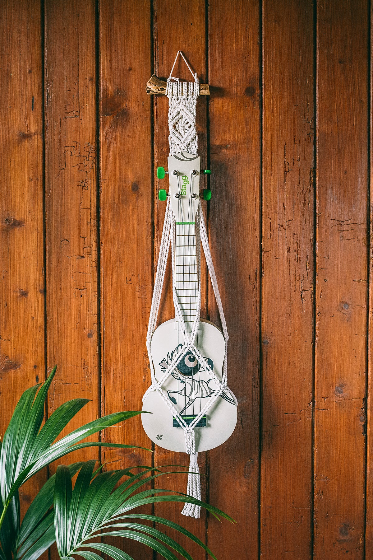Modern ukulele hanger