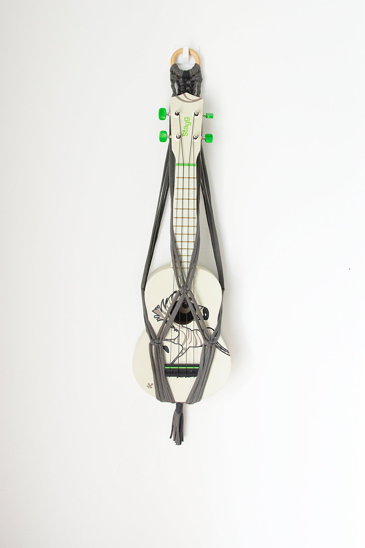 Grey ukulele hanger