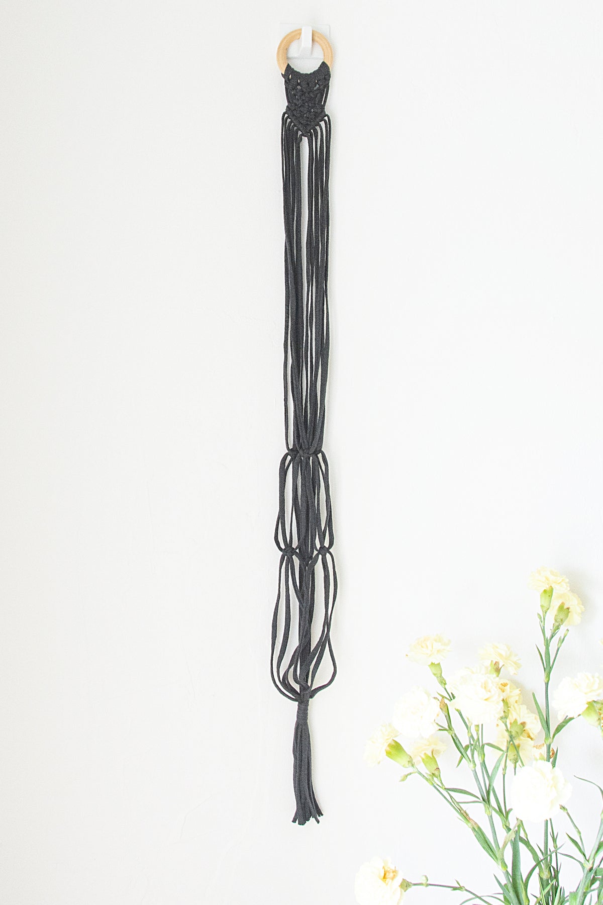 Grey hanger for ukulele