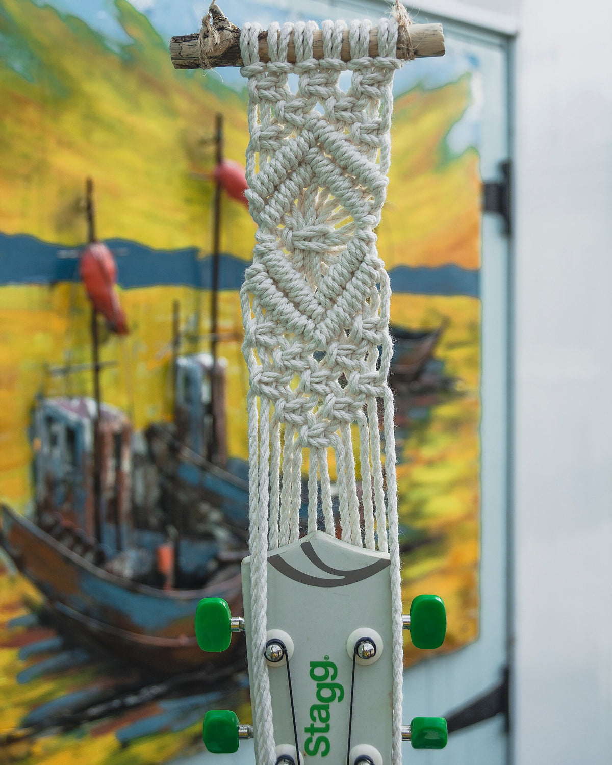 Modern ukulele hanger
