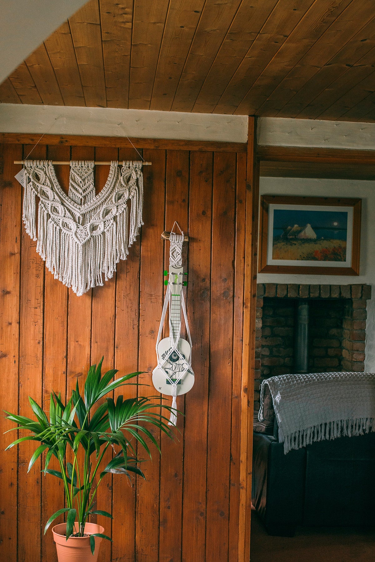 Modern ukulele hanger