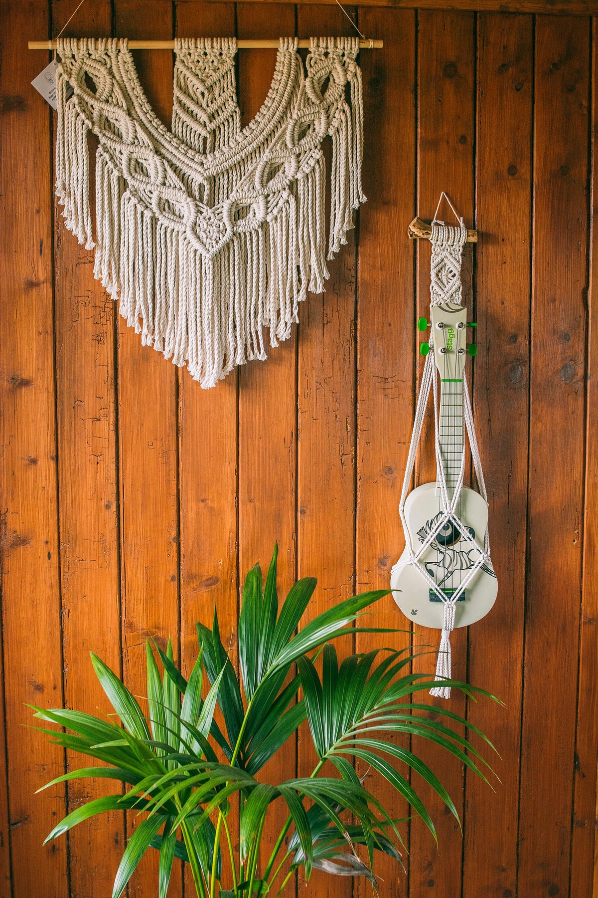 Modern ukulele hanger