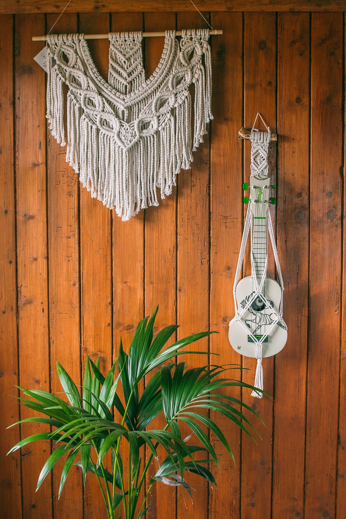 Modern ukulele hanger